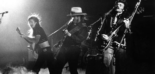AMSTERDAM, NETHERLANDS - JANUARY 01: The Doobie Brothers perform live on stage at Concergebouw in Amsterdam, Netherlands in 1974 L-R Pat Simmons, Tiran Porter, Tom Johnston (Photo by Gijsbert Hanekroot/Redferns)
