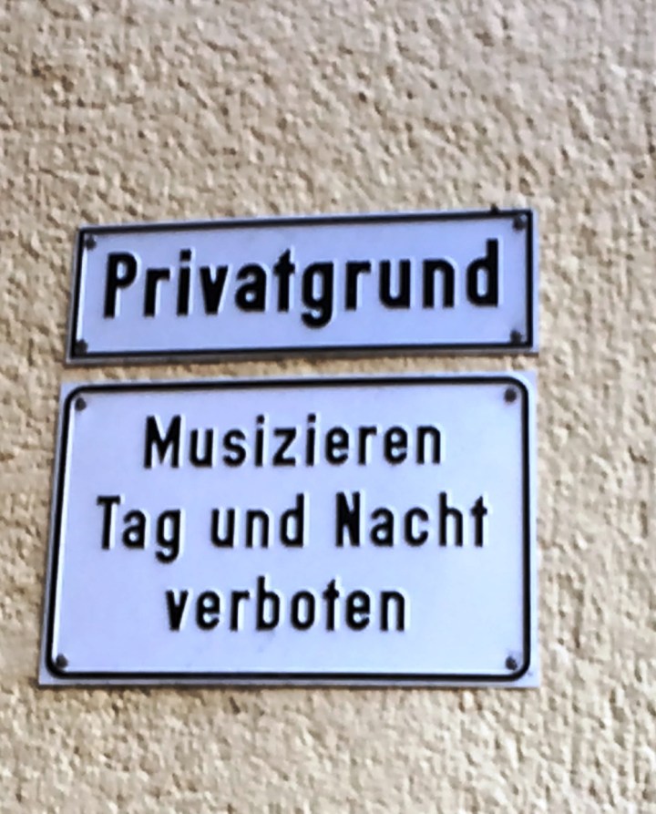 Funny sign on the way to HR Cafe: Private Property - musicians prohibited, day and night.